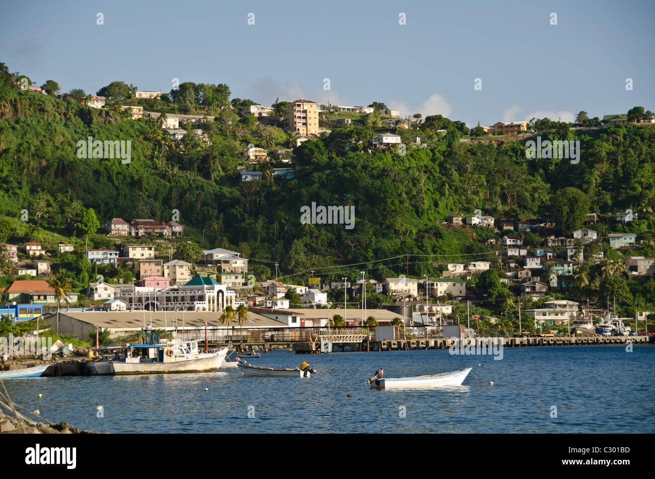 St Vincent Kingstown harbor fishing boats and city landscape Stock Photo