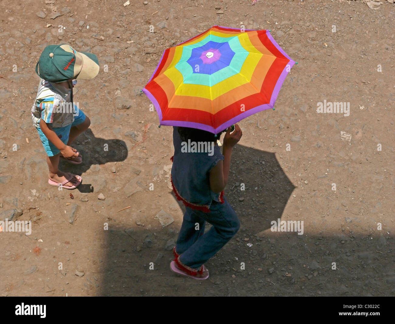 A Teenager, Girl with a Colorful Umbrella Stock Photo
