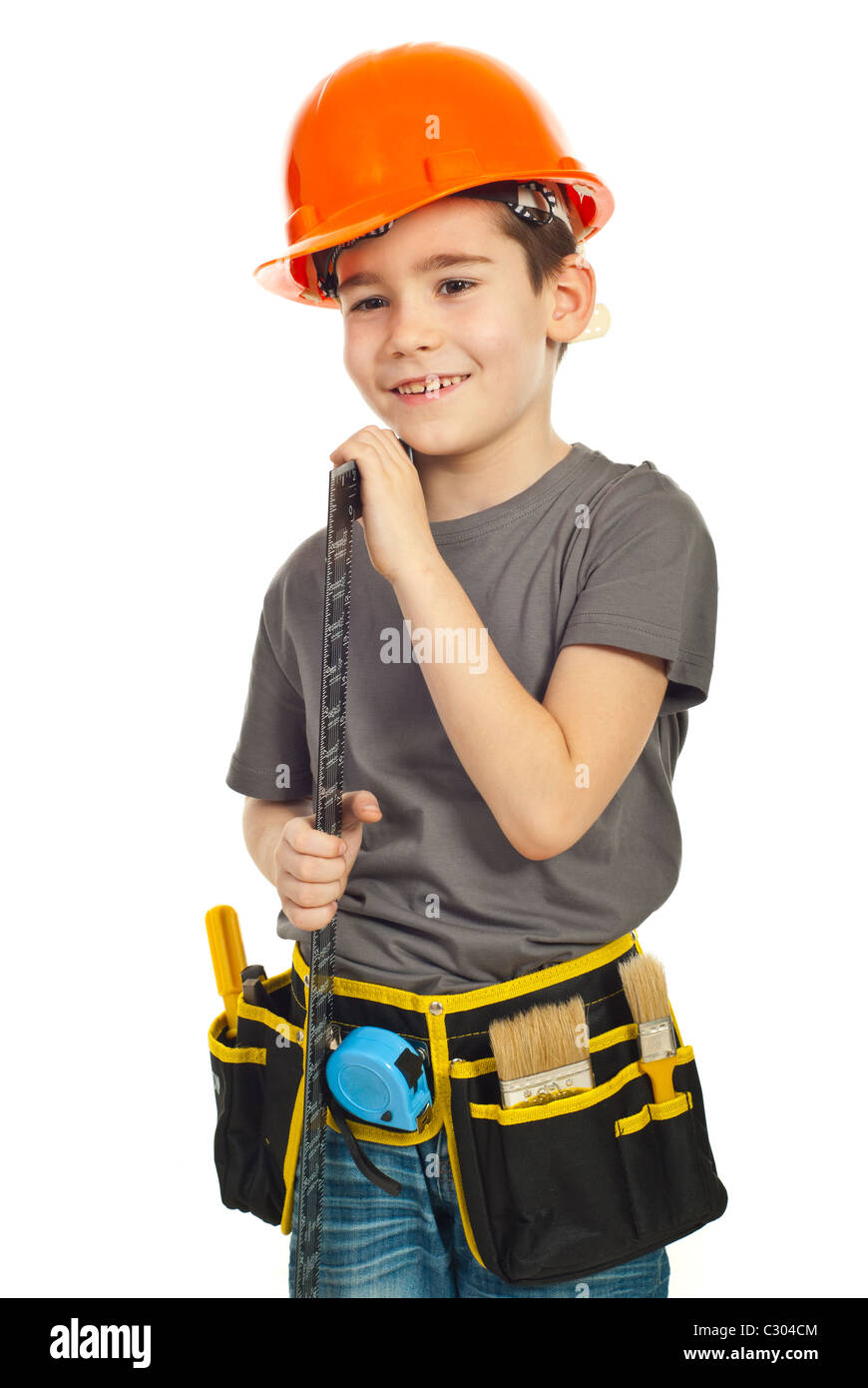 Happy kid with helmet carry a L square ruler isolated on white background Stock Photo