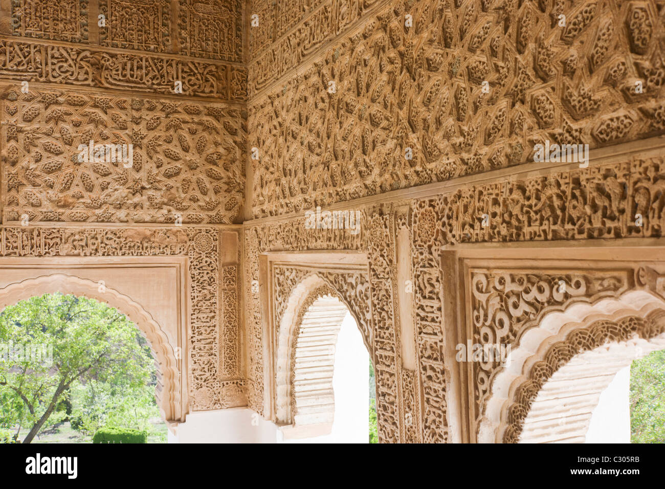 Ornate carving and architecture after conservation work in Court of the Sultana, Alhambra, Granada. Stock Photo