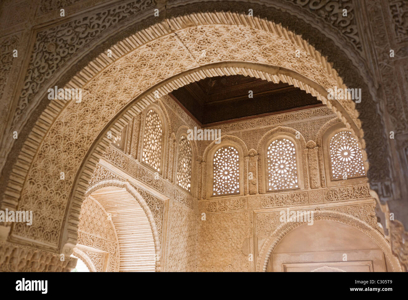 Ornate carving and architecture after conservation work in Court of the Sultana, Alhambra, Granada. Stock Photo