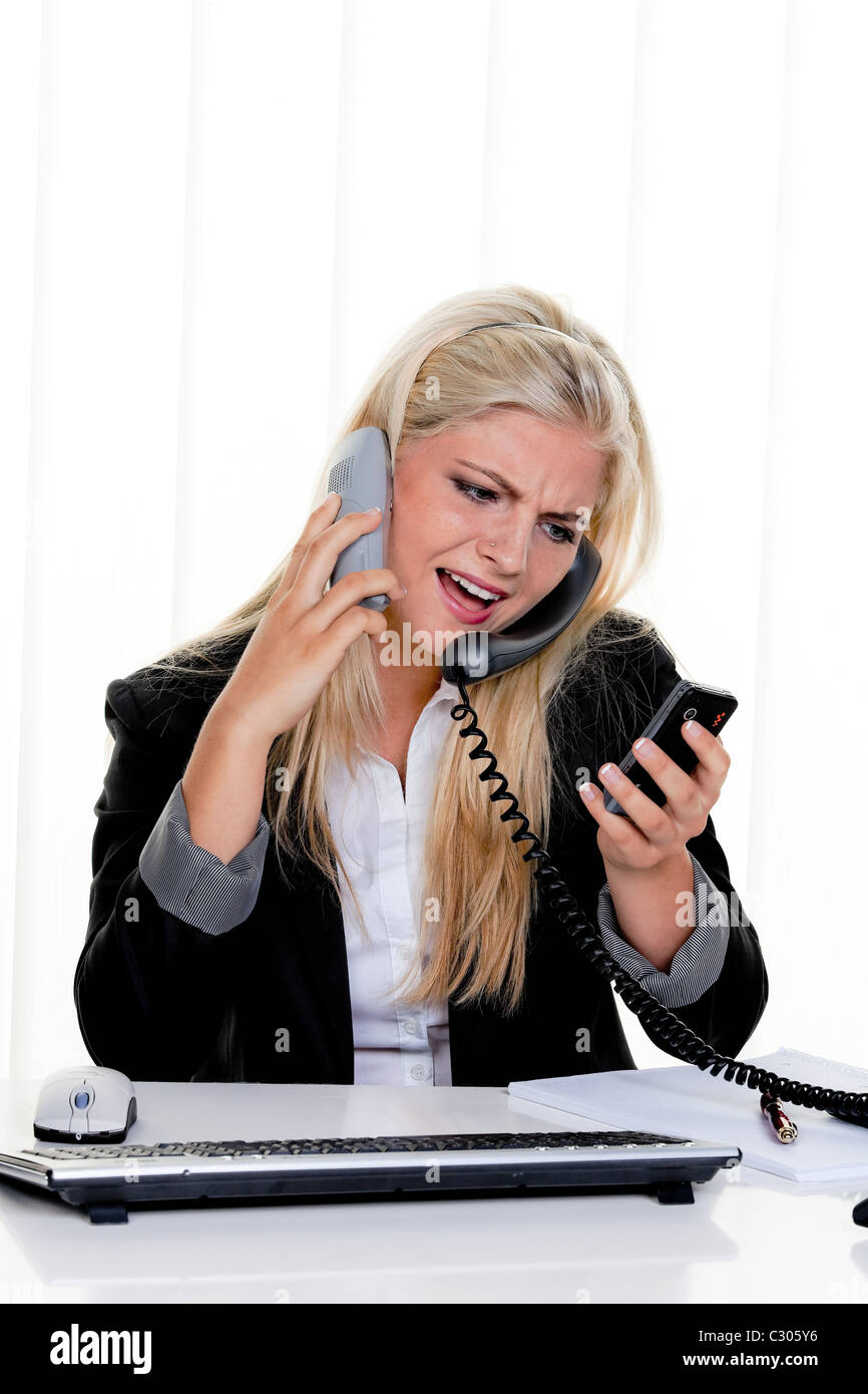 Woman with stress in the office Stock Photo