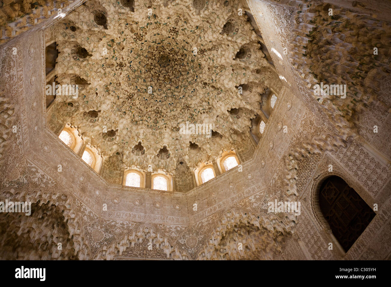 Ornate domed architecture in the Sala de dos Hermanas (Hall of the Two Sisters) in Alhambra Palace. Stock Photo