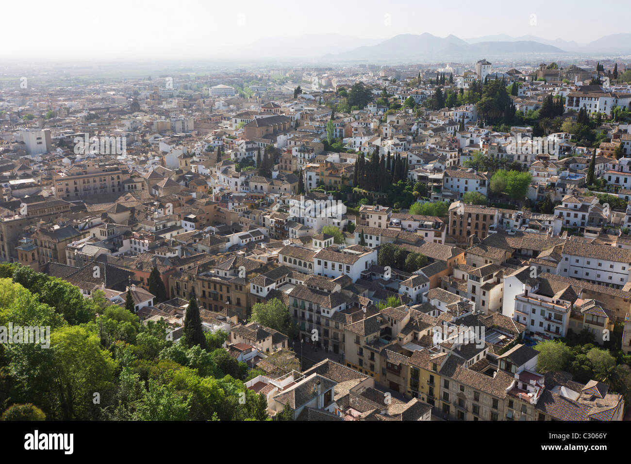 Aerial landscape of old Arab Albaicin quarter and surrounding barrios of Moorish city of Granada. Stock Photo