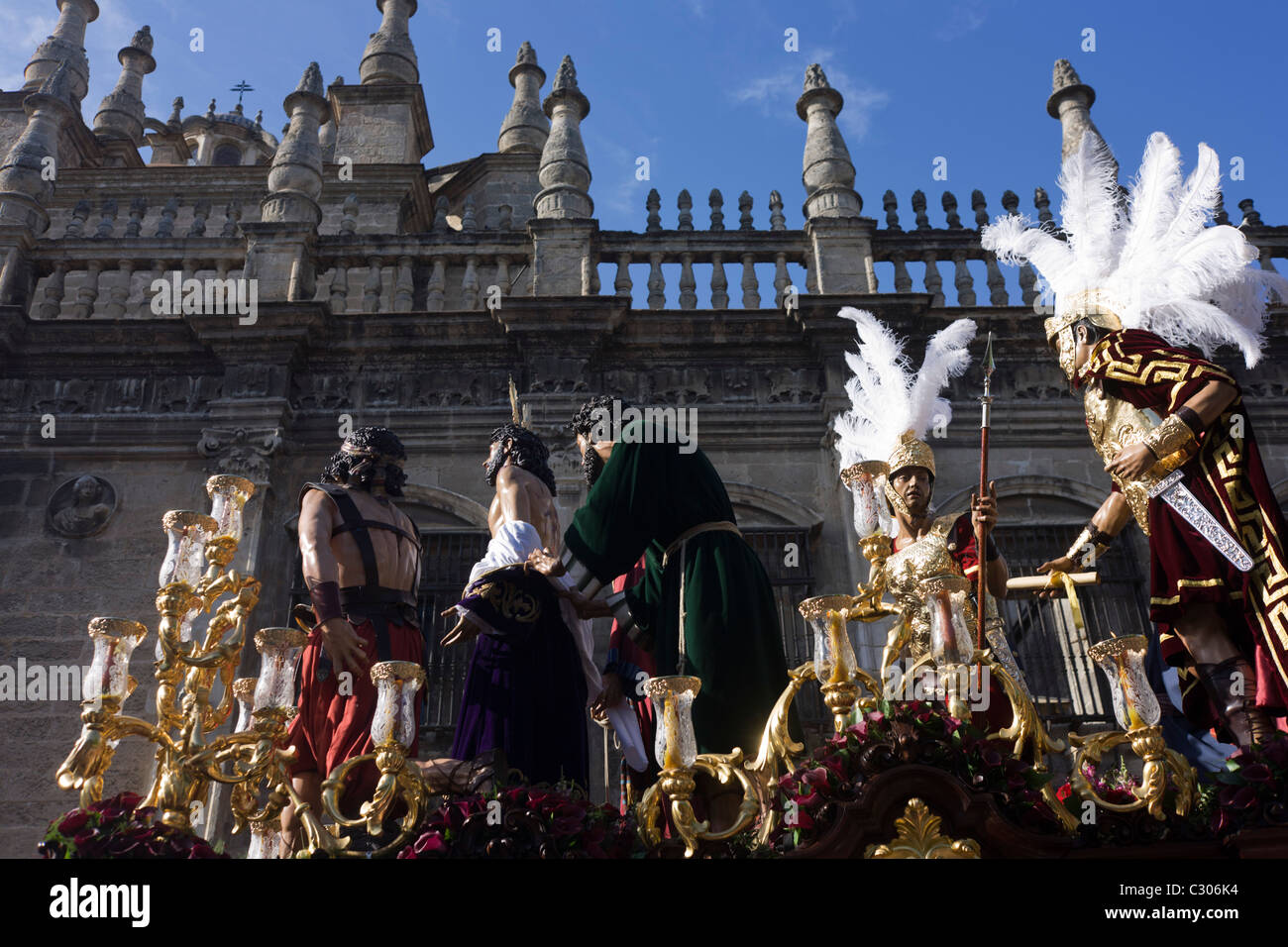 The Holy Paso depicting the Crucifixion passes through Seville during its annual Semana Santa Easter passion processions. Stock Photo