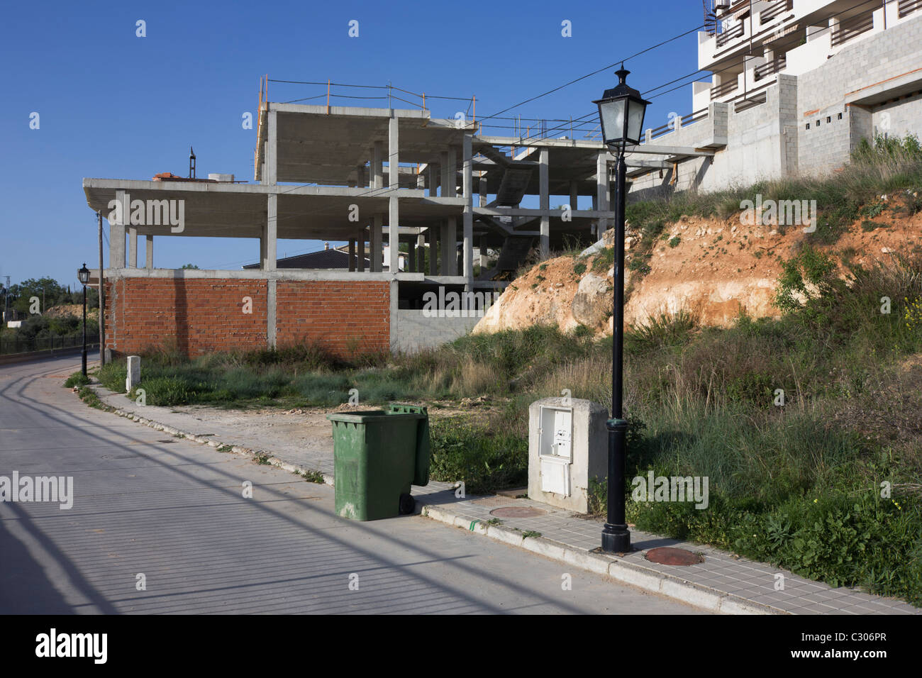 Unfinished and abandoned construction project in the town of Gogollos Vega, near Granada. Stock Photo