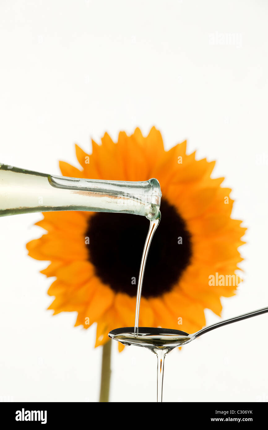 Cooking oil from sunflower seeds with flower Stock Photo Alamy