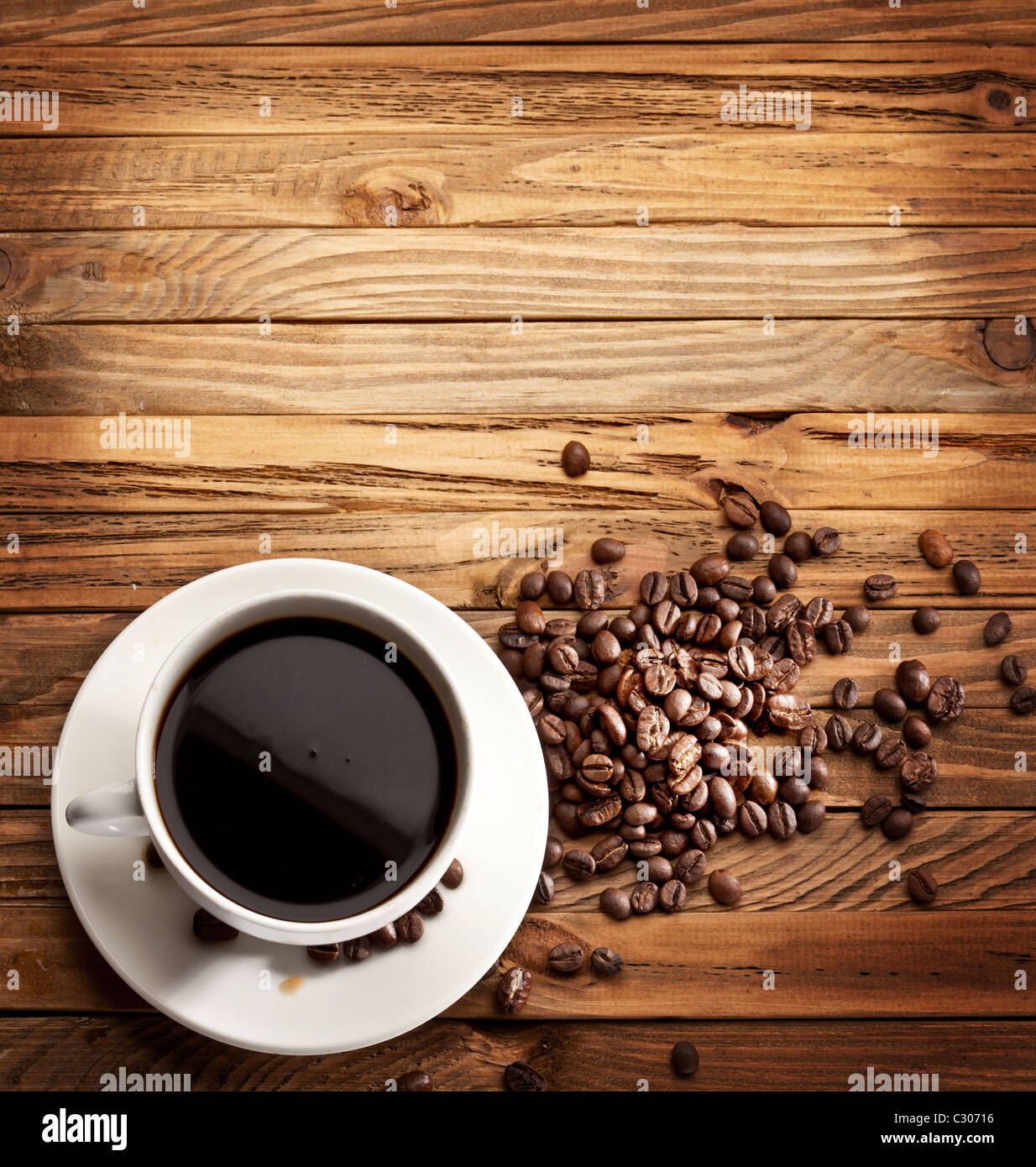 Cup of coffee. View from above on a wooden surface. Stock Photo