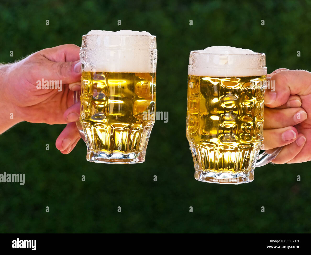 Two pitchers of beer to us beer foam Stock Photo