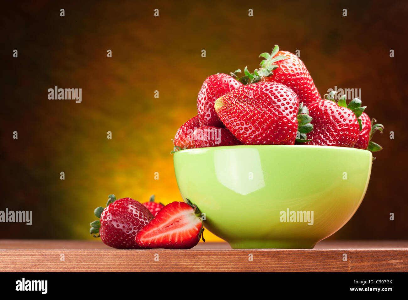 Appetizing strawberry in the bowl. Isolated on a white background. Stock Photo