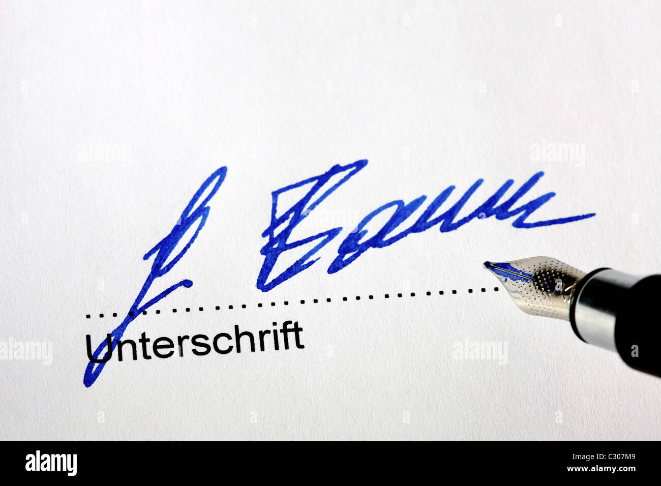 Fountain pen signature on a letter Stock Photo