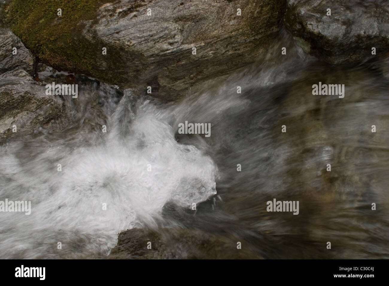 Spring thaw brings fresh water to a stream at a Western Massachusetts park on the Mohawk Trail. Stock Photo
