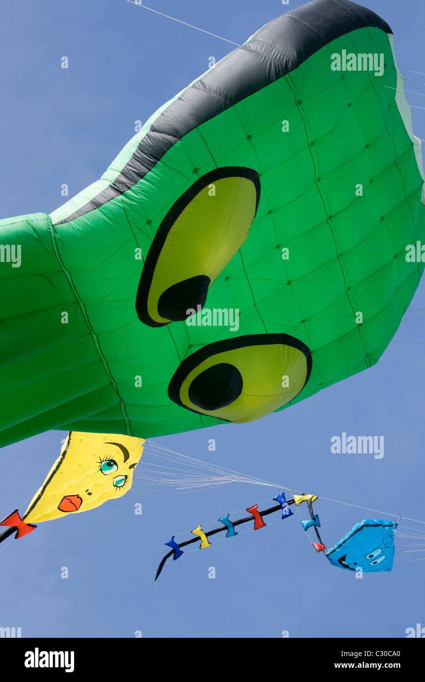 A large green octopus shaped kite at the family fun day at Streatham Park, south London. Stock Photo