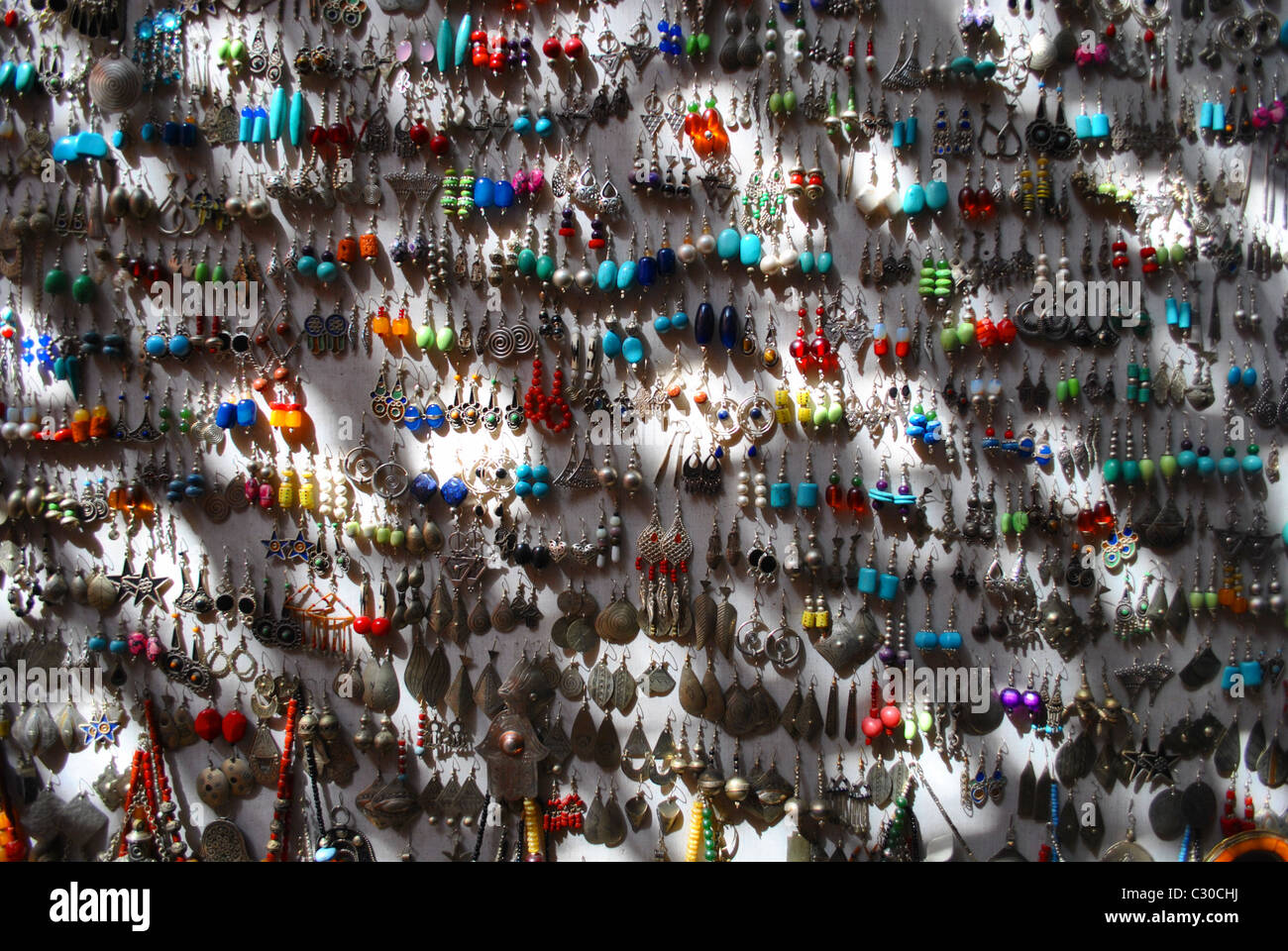 Earrings in a souk in Marrakesh, Morocco Stock Photo