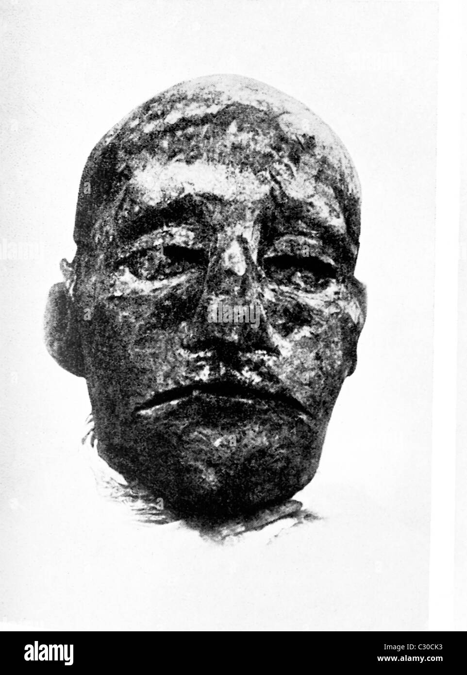 The mummy head pictured in this photograph dating to 1907 is of Ramesses III of the 20th Dynasty. Stock Photo
