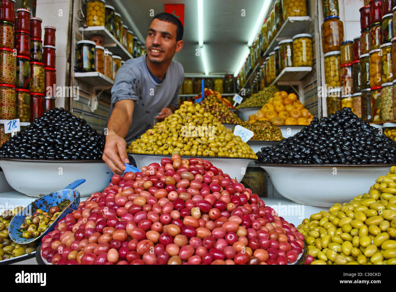 Olive vendor in Marrakesh, Morocco Stock Photo