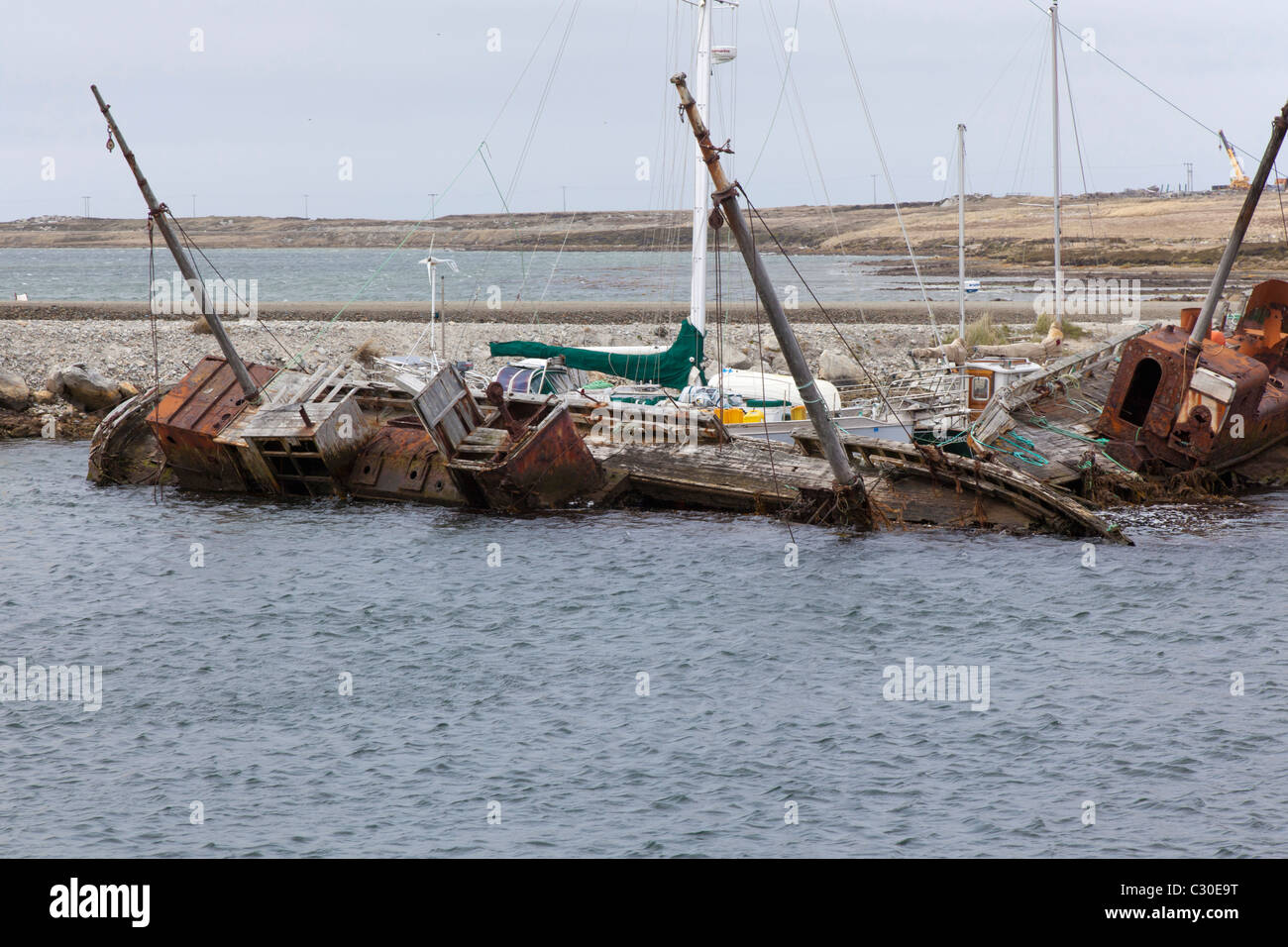 Sunken ships in the harbour at Port Stanley, East Falklands Stock Photo