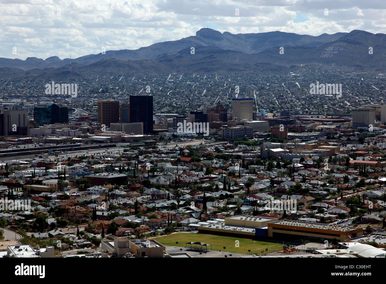 The downtown of El Paso, Texas from a scenic overlook.  Juarez, Mexico is just beyond the buildings of the city. Stock Photo