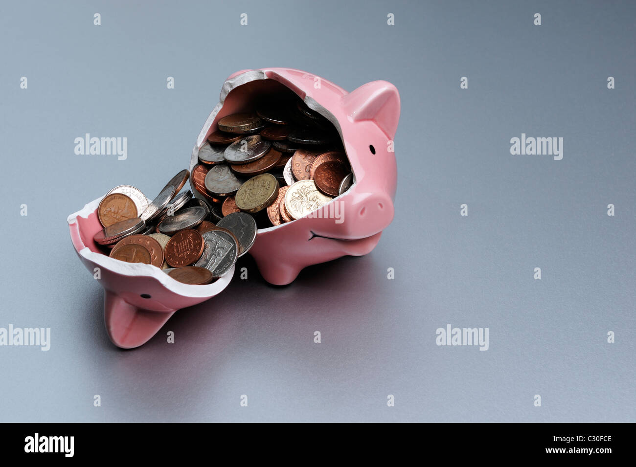 Broken piggy bank Stock Photo