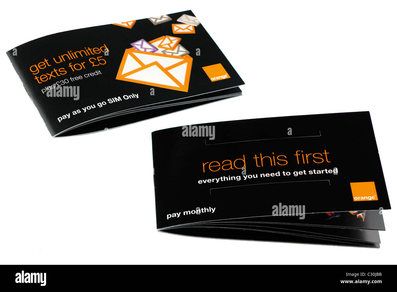 Orange mobile phone booklets. EDITORIAL ONLY Stock Photo