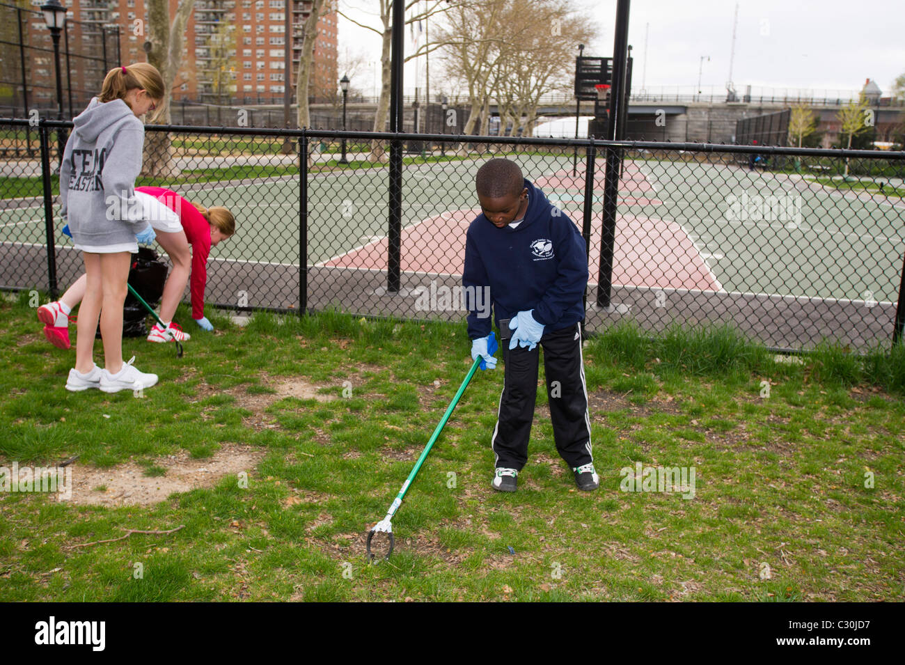 Clean Up Day in Harlem around the 369th Harlem Armory in New York on Earth Day Stock Photo Alamy