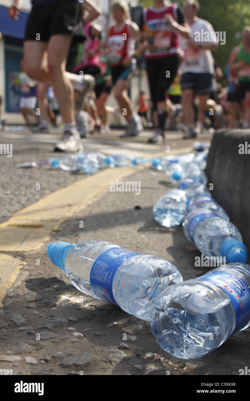 Discarded plastic water bottles on route of London Marathon Stock Photo