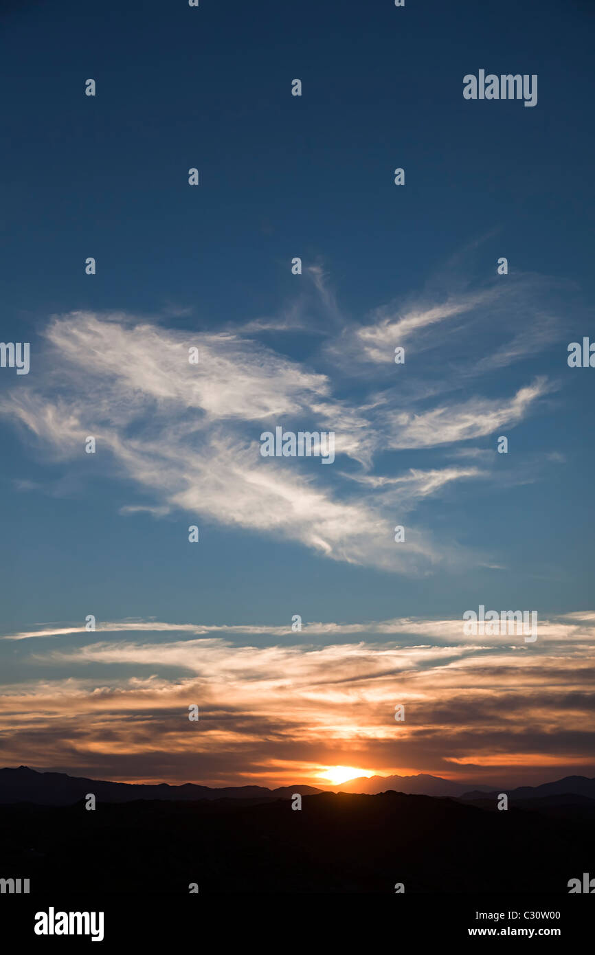 Wispy clouds at sunset Cap de Creus Parc Natural de Cap de Creus Emporda Catalunya Spain Stock Photo