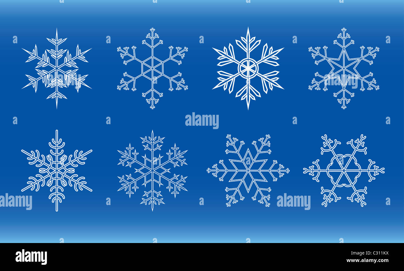 different white snowflakes on a blue background Stock Photo - Alamy
