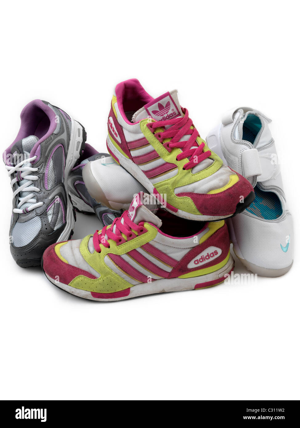 A Pile Of Trainers Adidas Ontario, Sketchers Sport And Nike Stock Photo ...