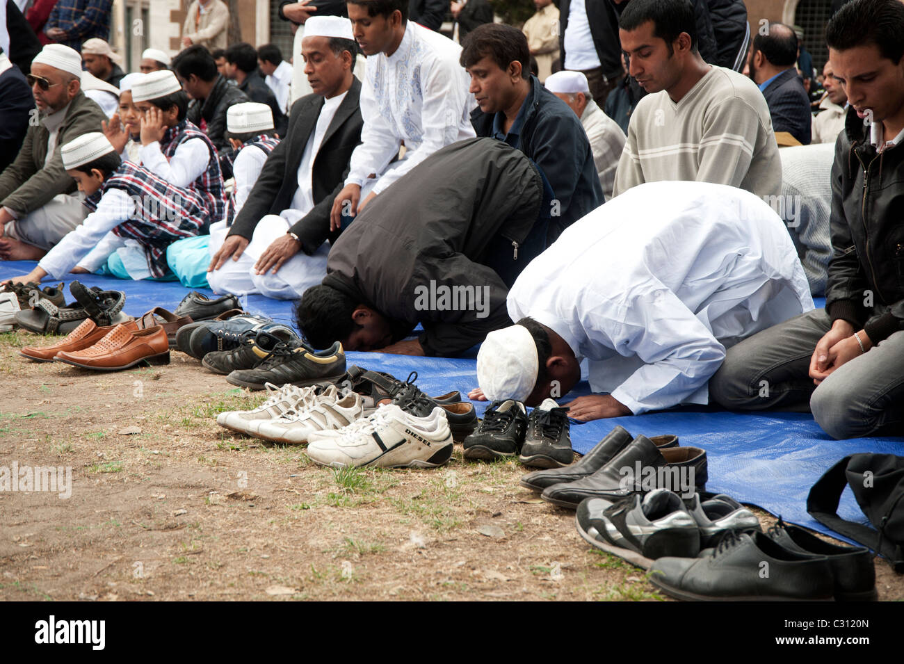 Rome, Italy -  April 22, 2011 - Muslim people praying Stock Photo