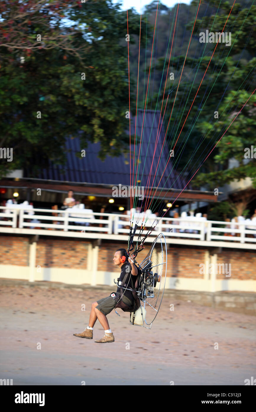 Motorized paraglider on Ao Nang Beach. Stock Photo