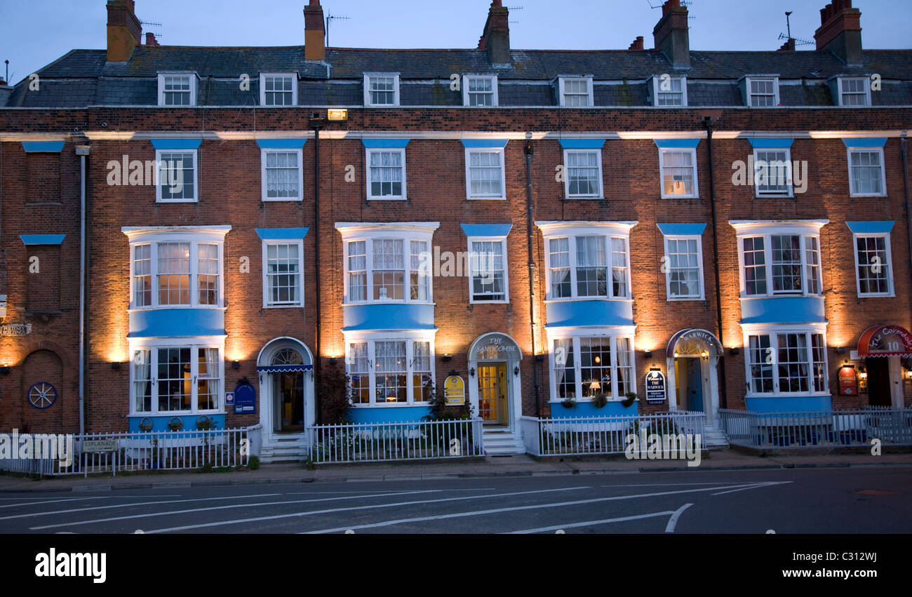 Row guest houses hotels Esplanade Weymouth Dorset England Stock Photo