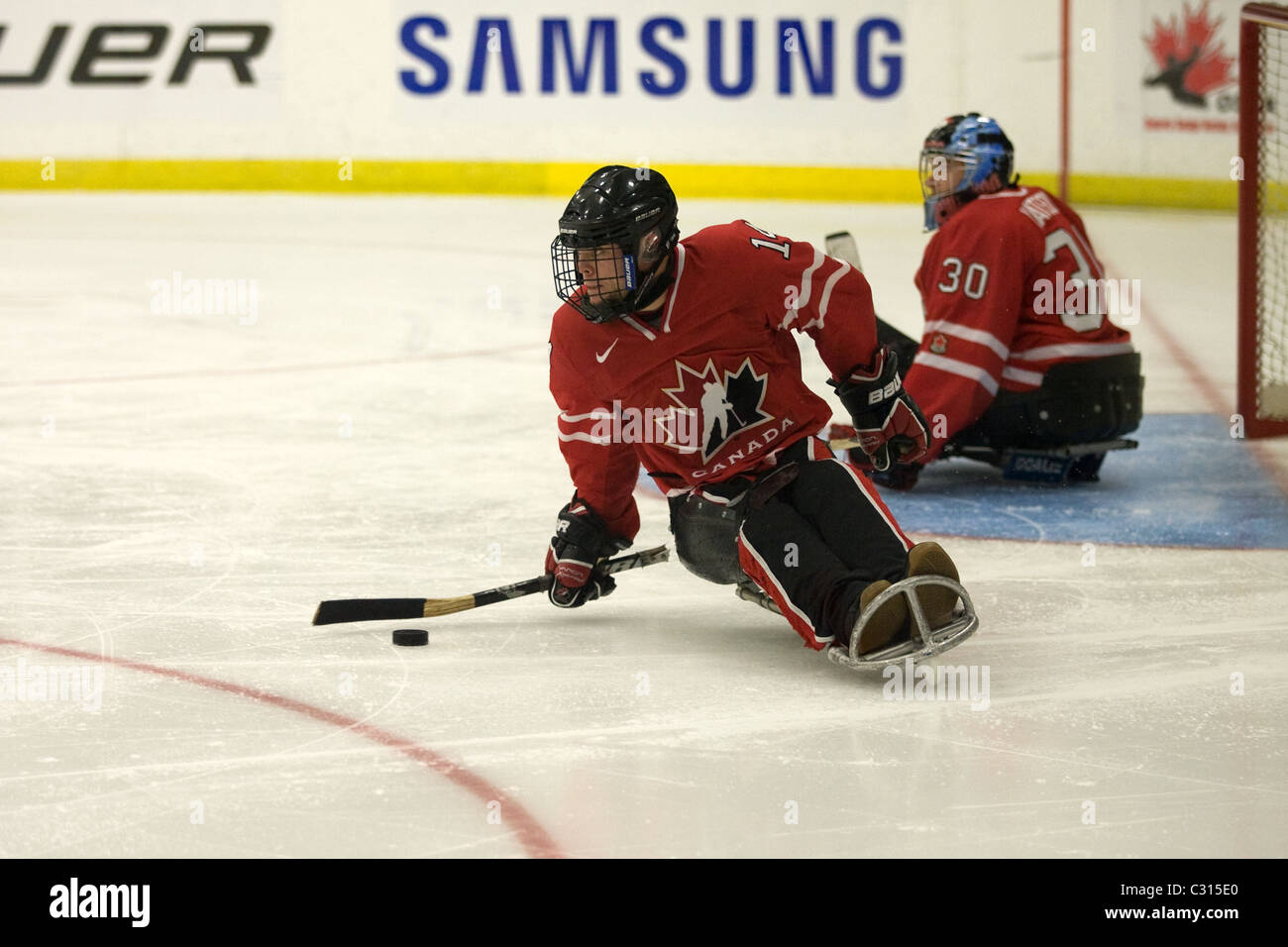 Gold medal game of the 2011 International Sledge Hockey Challenge between Team Canada and Team Norway Stock Photo