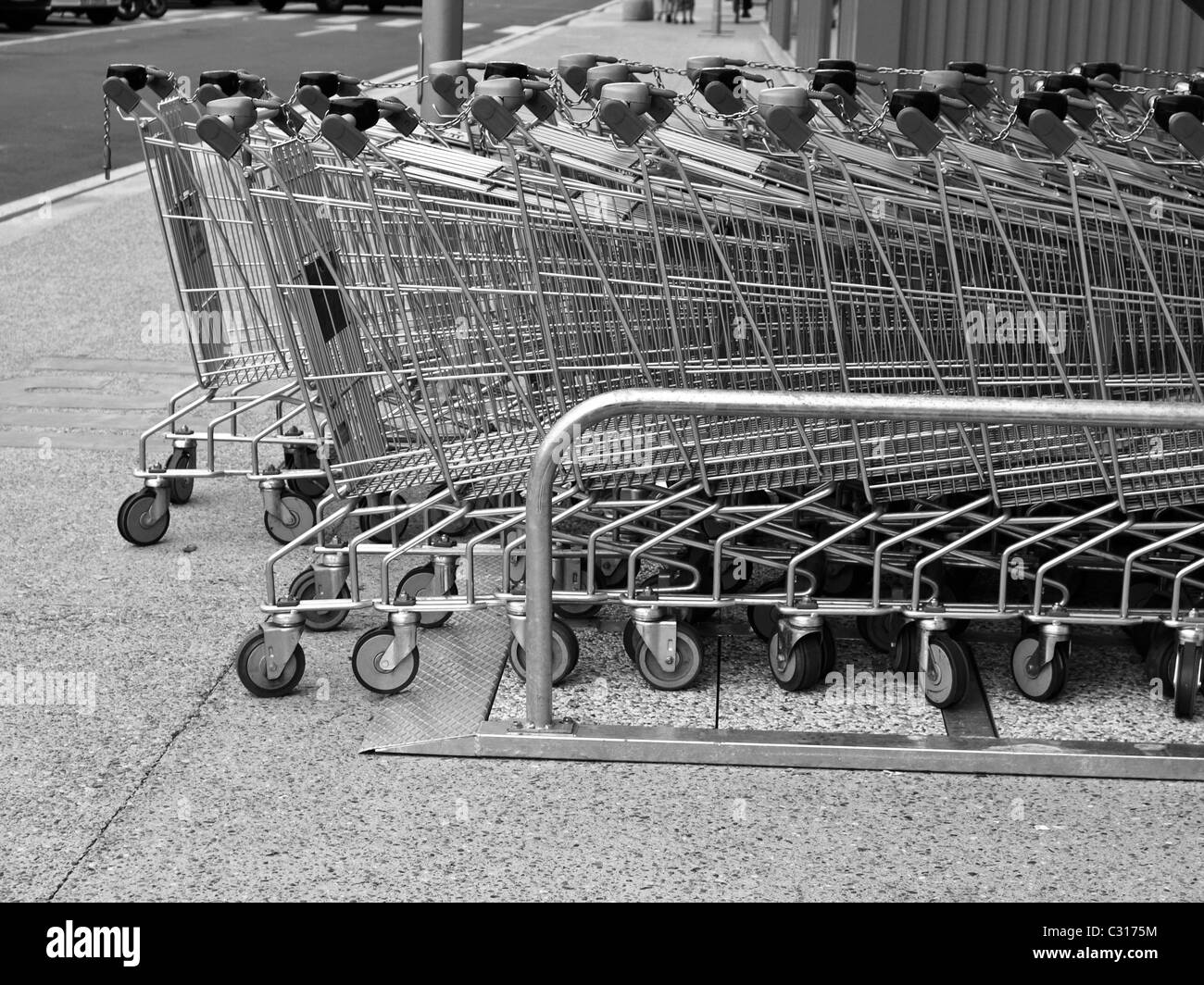 Row of supermarket shopping carts or trolleys Stock Photo Alamy