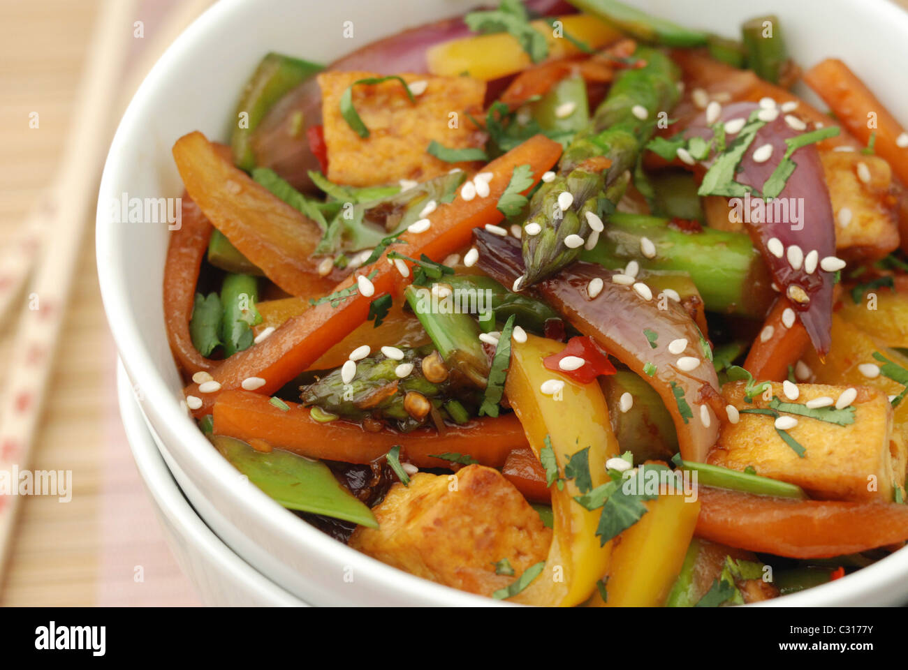 Spring vegetable and tofu stir-fry Stock Photo