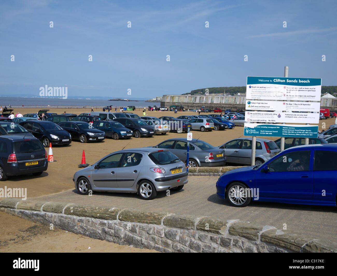 Cars parking on Clifton sands beach Weston-Super-Mare North Somerset UK Stock Photo