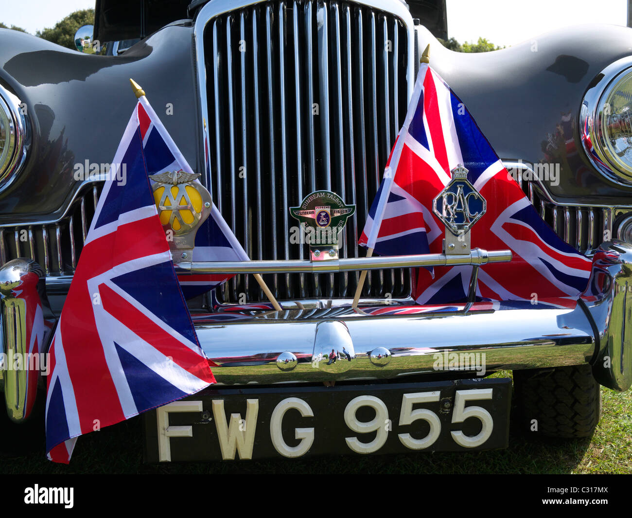 Front of a Sunbeam Talbot with Union Jack flags at a classic car show Weston-Super-Mare North Somerset UK Stock Photo