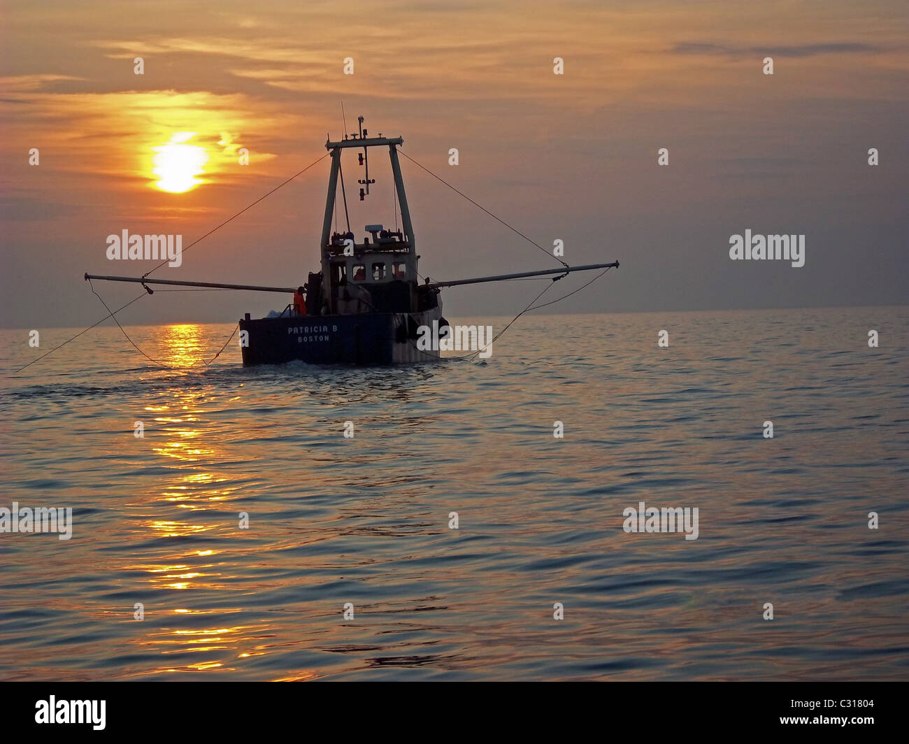 Trawler sunset hi-res stock photography and images - Alamy