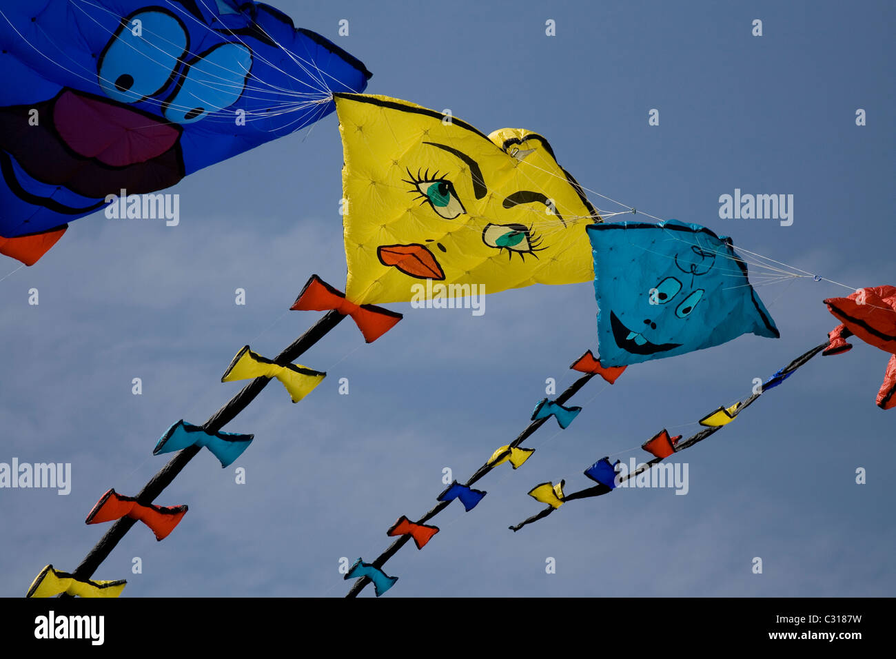 Four kites in a row at Streatham Park, family kite day. Stock Photo