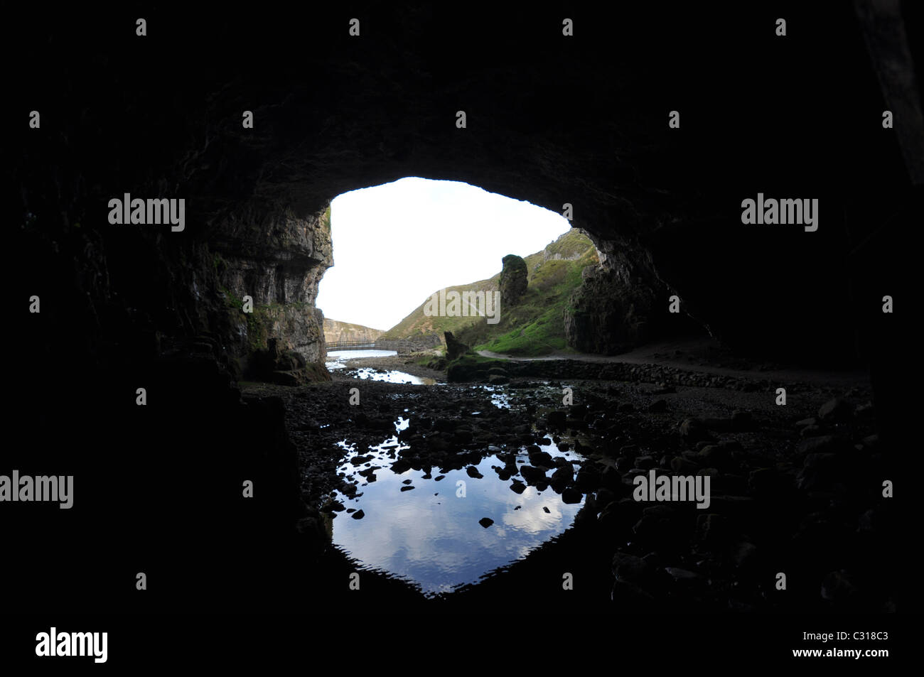Sky reflection on the sea water in Smoo Cave Stock Photo - Alamy