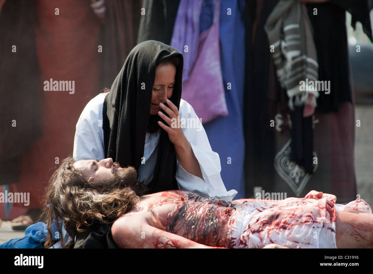 Mary over Jesus dead body Easter Passion Play performed by the in Trafalgar Square Good Friday Stock Photo