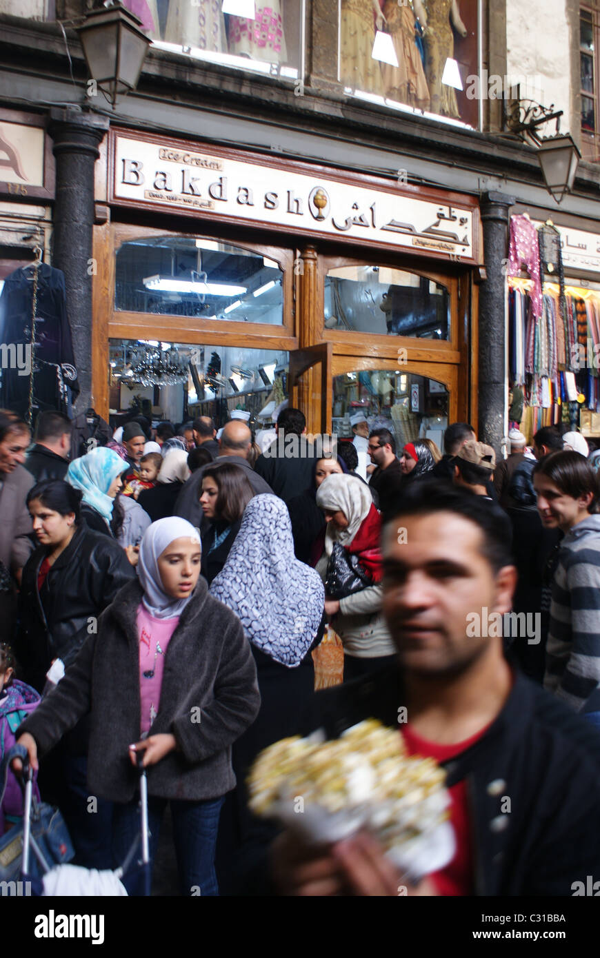 Shoppers outside Bakdash, Damascus, Syria Stock Photo