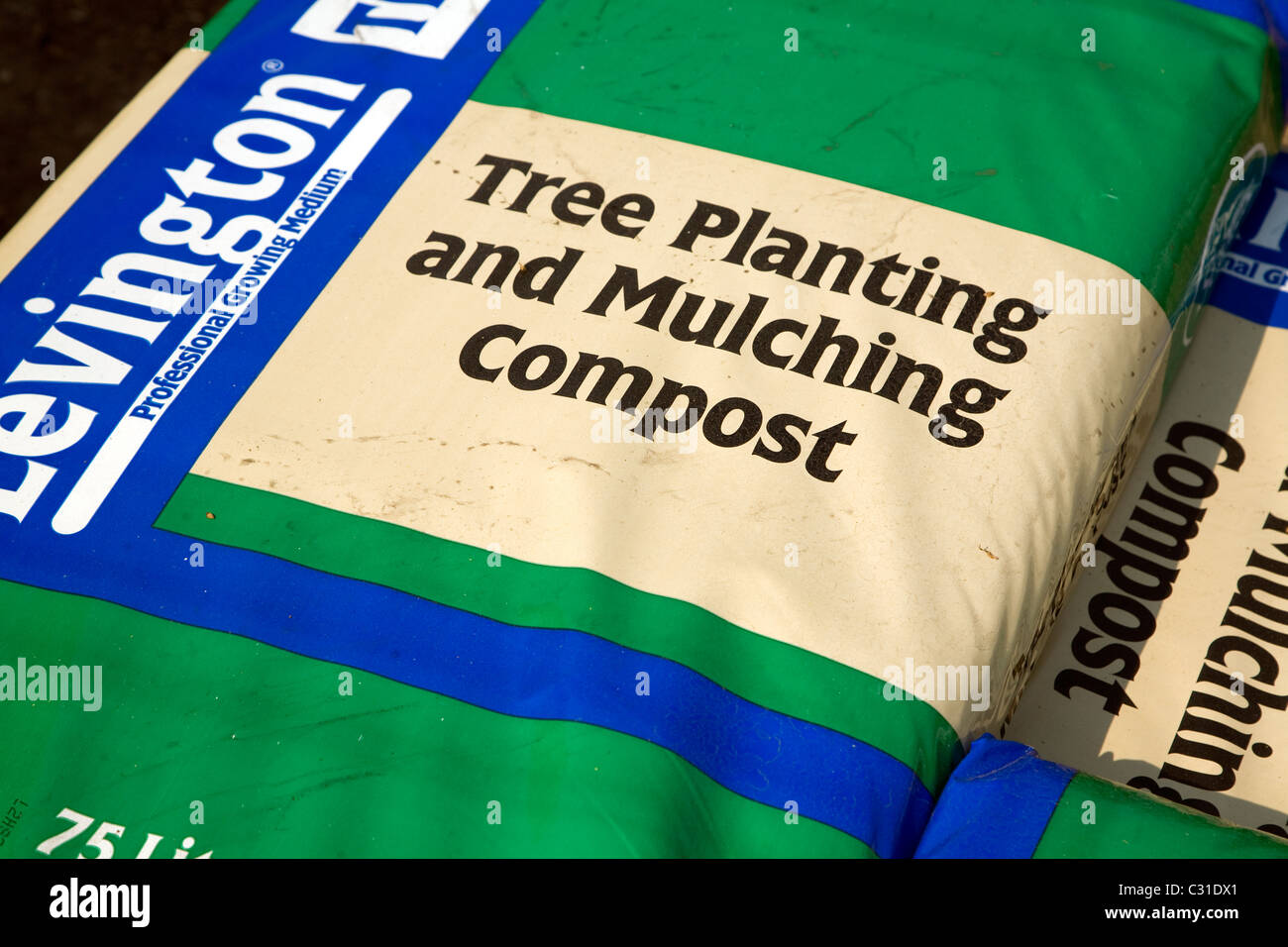 Bags pile tree planting mulching compost Stock Photo