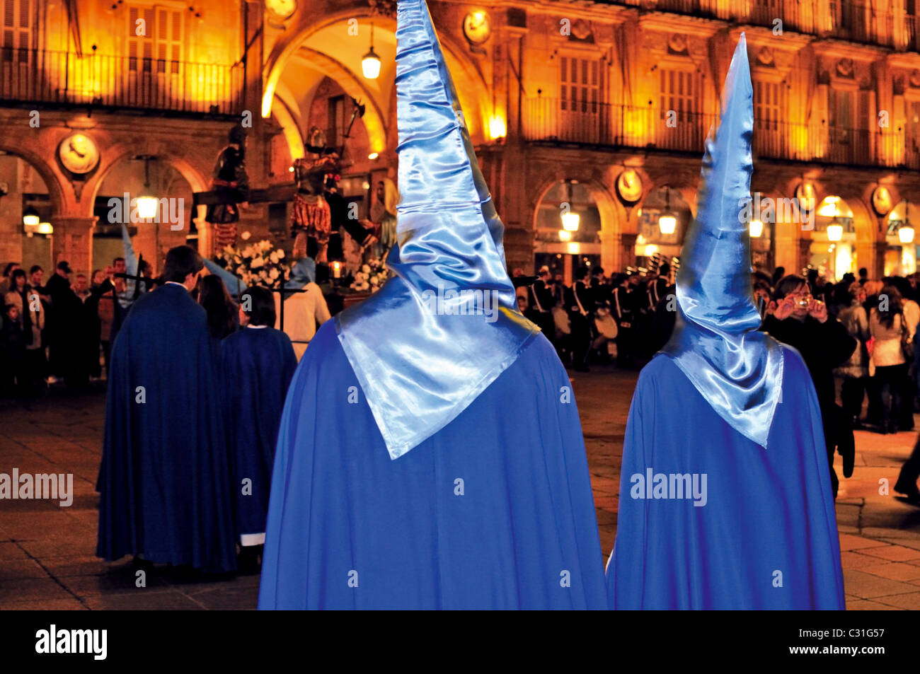 Spain, Salamanca: Nocturnal Easter Friday Procession passing the Plaza Mayor square Stock Photo