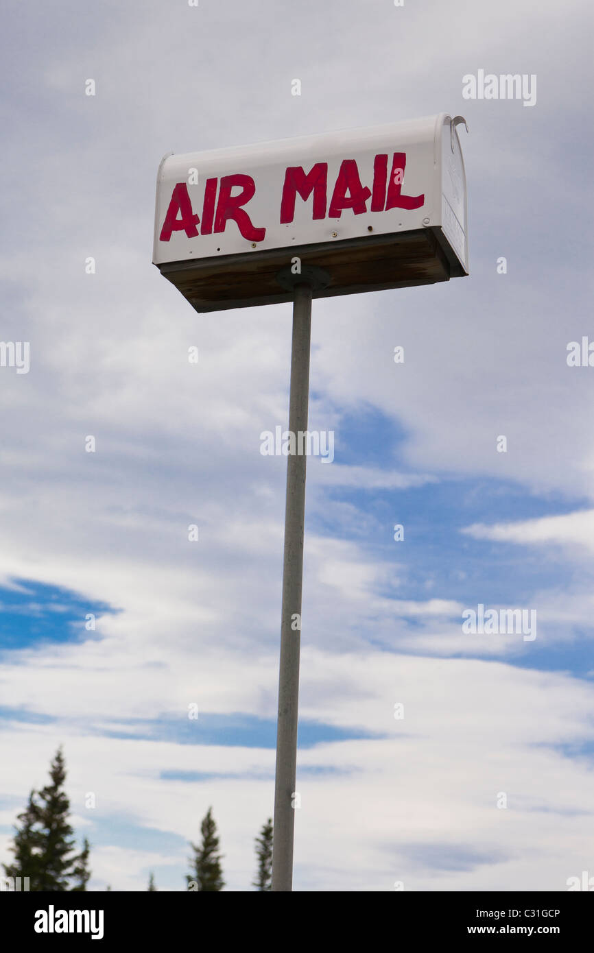 THOMPSON PASS, ALASKA, USA - Air Mail mailbox on tall pole. Stock Photo