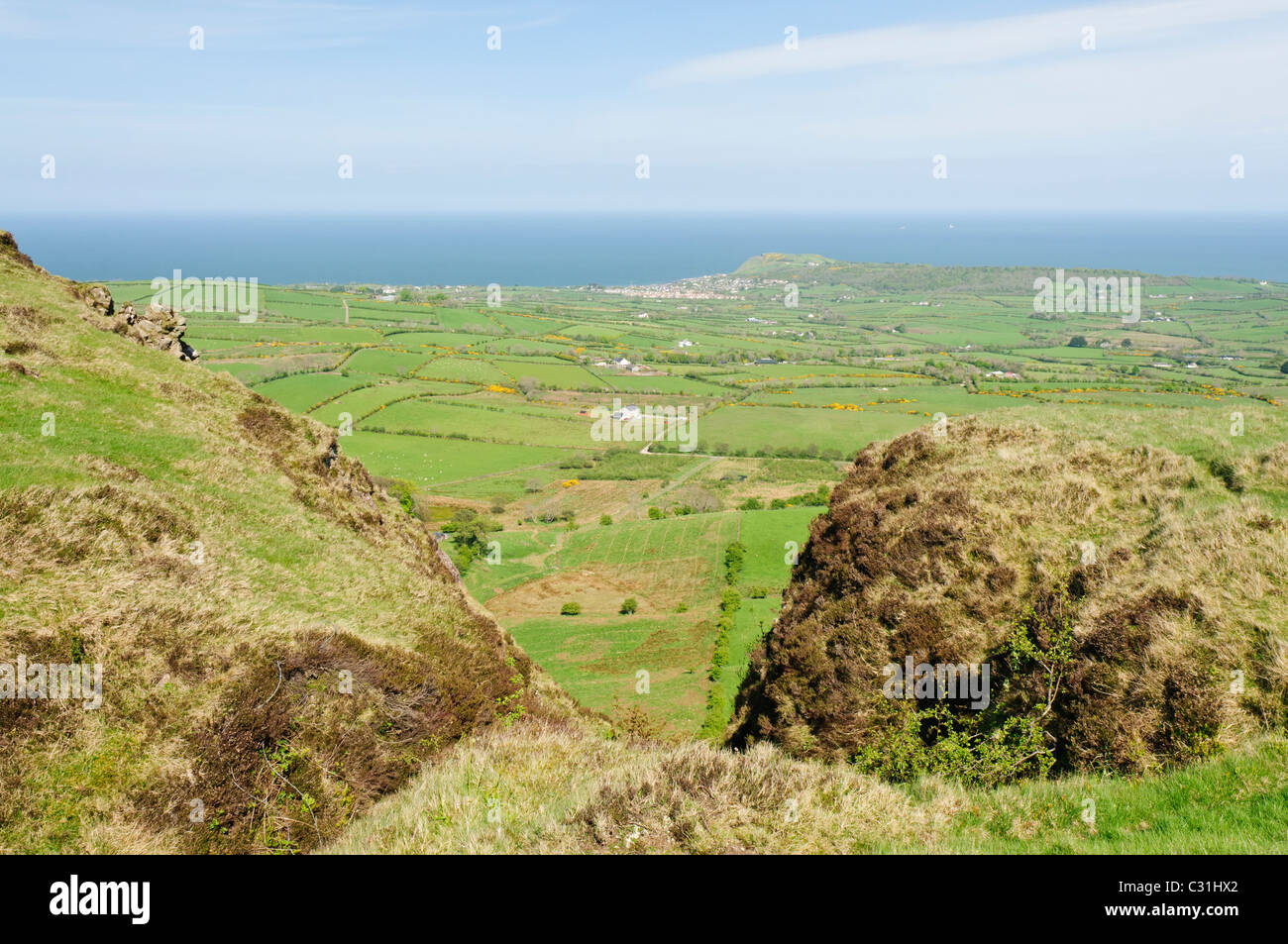 View from top of Sallagh Braes looking towards Ballygalley.  Location has been used many times as a location for Game of Thrones. Stock Photo