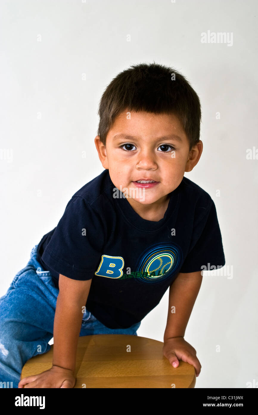 4-5 year old ethnic diversity diverse multicultural multi Hispanic boy portrait eye contact  MR © Myrleen Pearson Stock Photo
