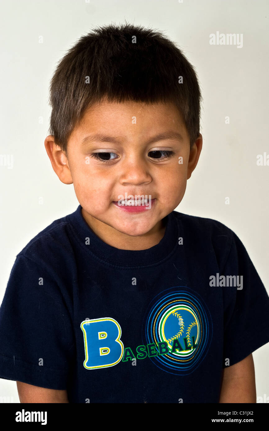 4-5 year old multi ethic diverse Hispanic boy portrait thoughtful dreaming sitting MR © Myrleen Pearson Stock Photo