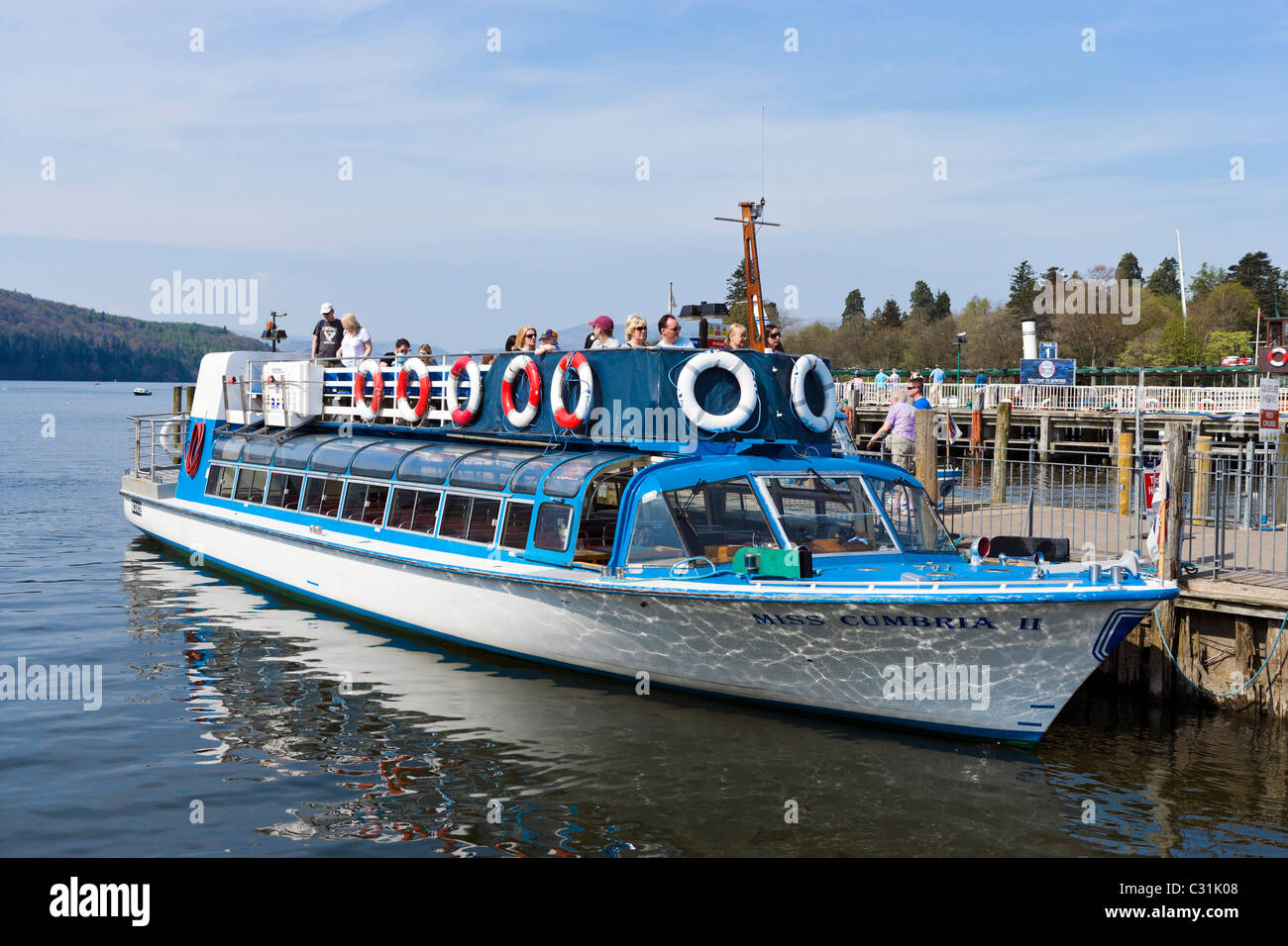 Tourists on an excursion boat in Bowness, Lake Windermere, Lake District National Park, Cumbria, UK Stock Photo