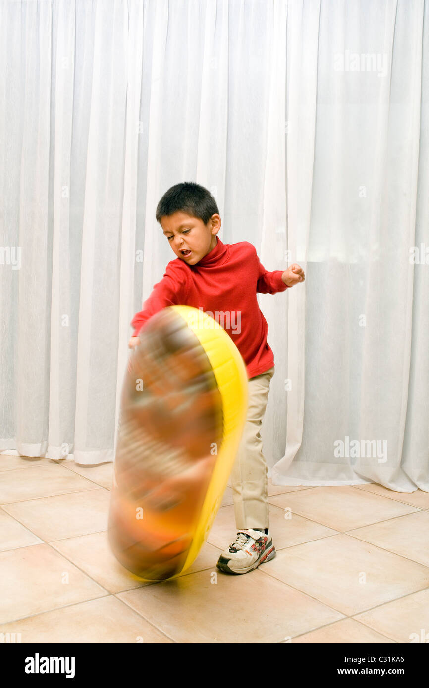 Pre-K 4-5 years year old olds Hispanic boy learning healthy activity to release anger. MR © Myrleen Pearson Stock Photo